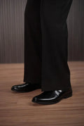 Men’s black bell bottom dress pants – waistband button detail